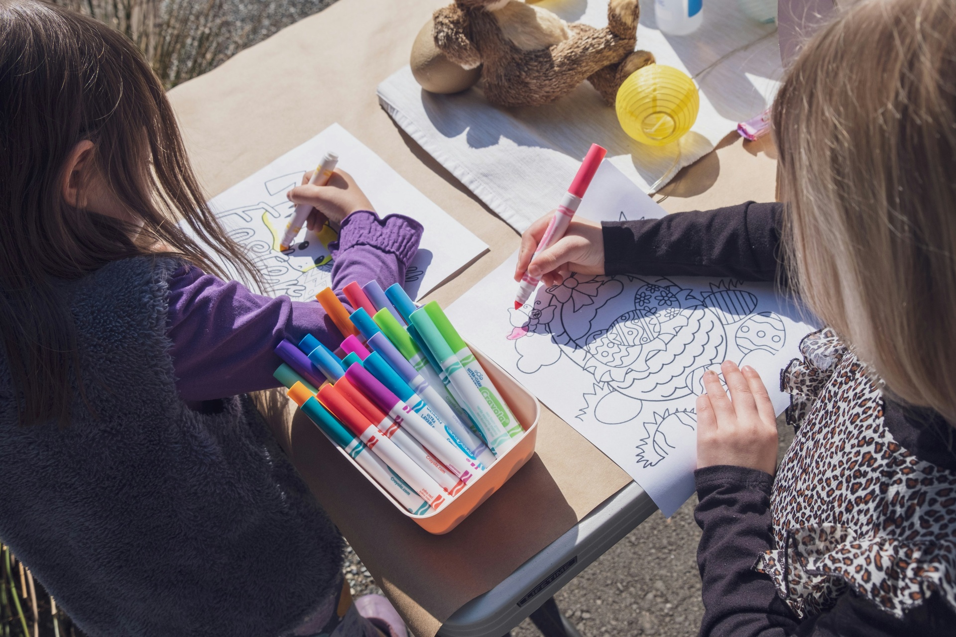 Children colouring together at an art class